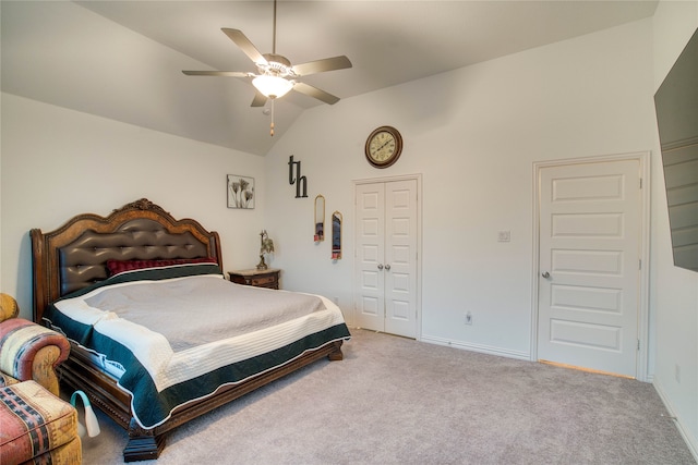 carpeted bedroom with ceiling fan and lofted ceiling