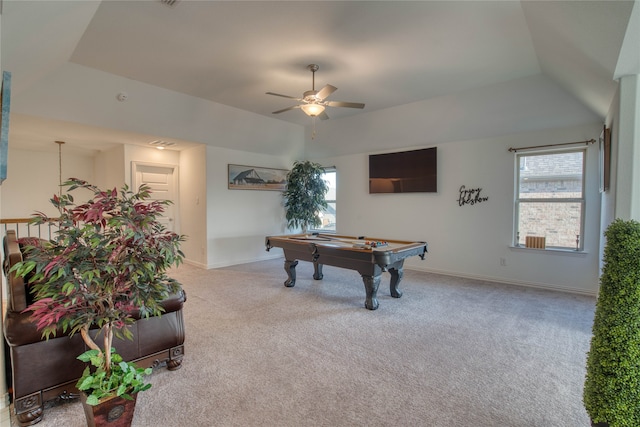 game room featuring ceiling fan, pool table, light colored carpet, and a tray ceiling