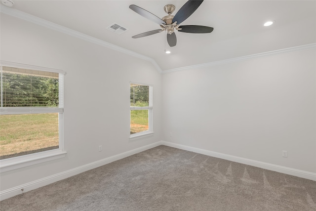 carpeted spare room featuring ceiling fan, crown molding, and lofted ceiling