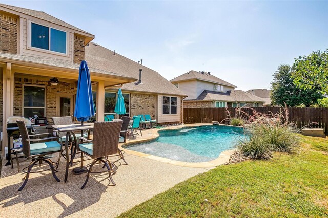 front facade featuring a front yard and a garage