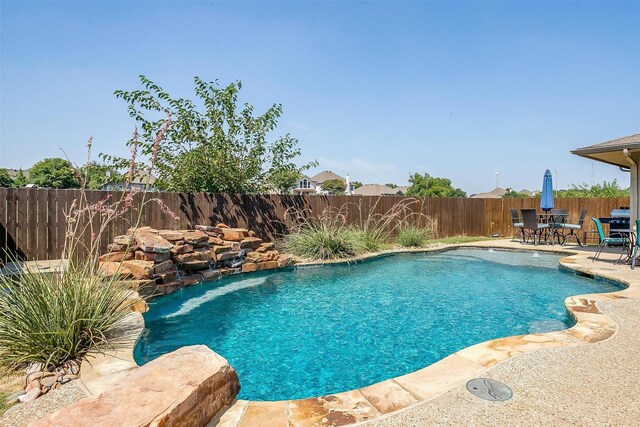 view of pool with a patio