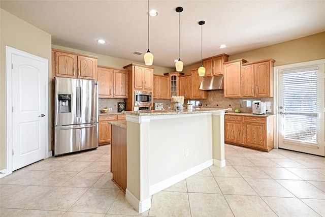 kitchen with a center island, decorative backsplash, light stone counters, light tile patterned floors, and stainless steel appliances