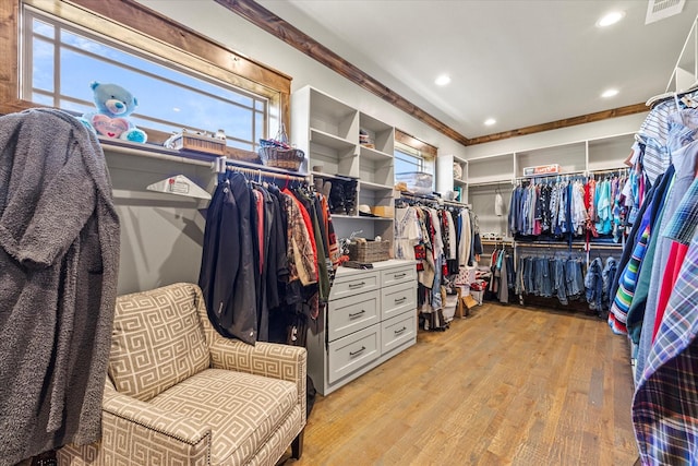 spacious closet with visible vents and light wood-style floors