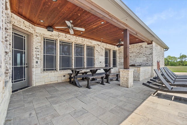 view of patio featuring ceiling fan