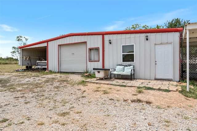 view of outdoor structure featuring a garage