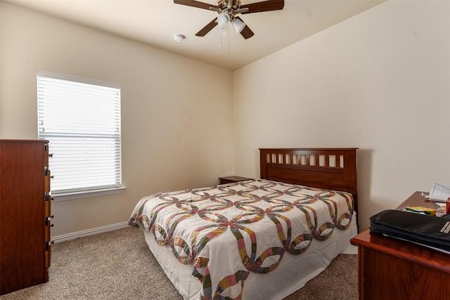 bedroom with light carpet and ceiling fan