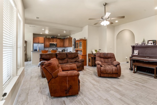 living room with ceiling fan