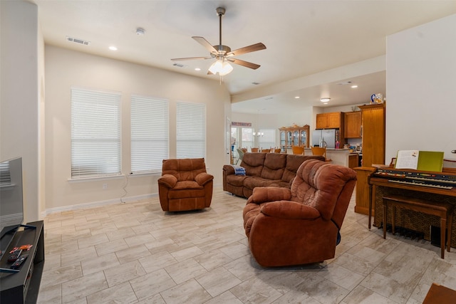 living room with ceiling fan