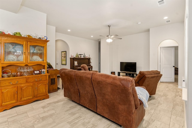 living room featuring ceiling fan