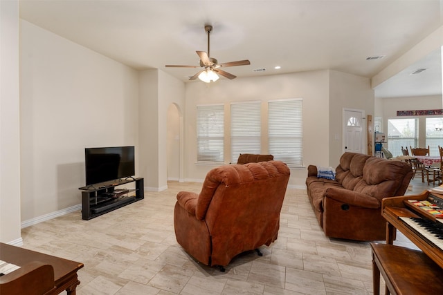 living room with ceiling fan