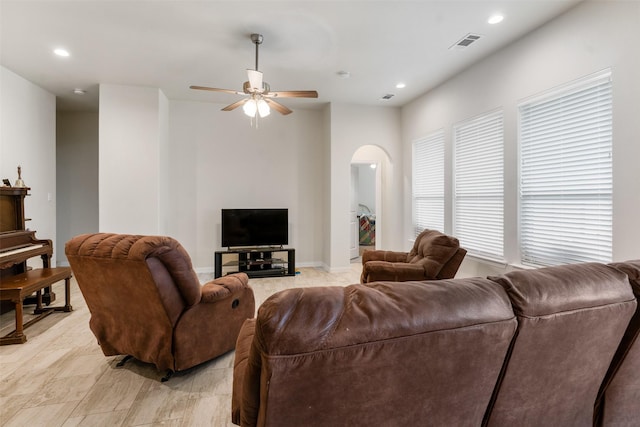 living room featuring ceiling fan