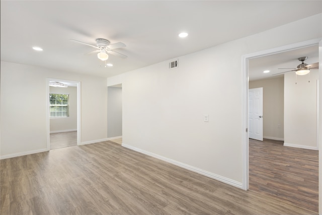 corridor with wood walls, vaulted ceiling, wood ceiling, and dark hardwood / wood-style flooring