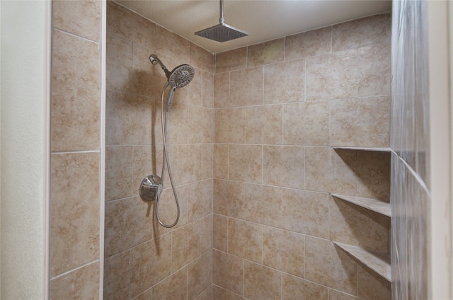 bathroom with tile patterned floors, sink, and tile walls