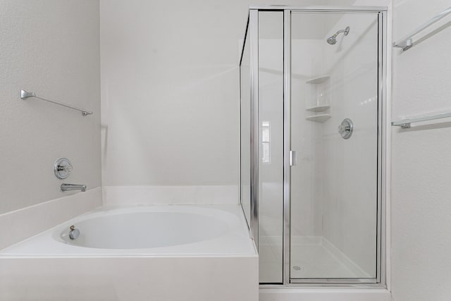 bathroom with independent shower and bath