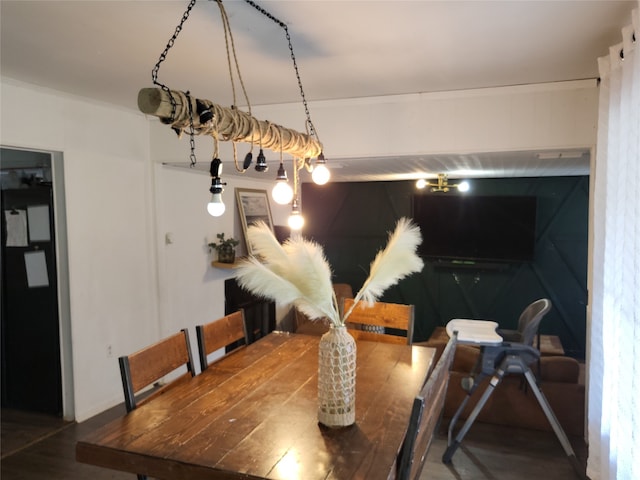 dining area featuring wood-type flooring