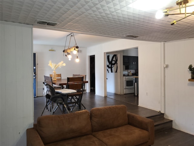 living room with dark hardwood / wood-style floors