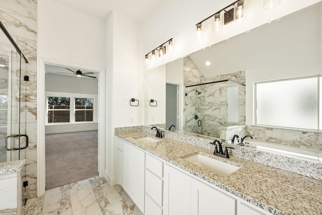 bathroom with plenty of natural light, ceiling fan, independent shower and bath, and vaulted ceiling