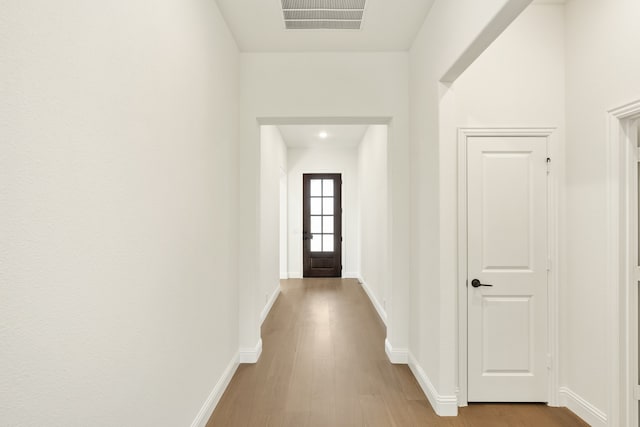 hall featuring light hardwood / wood-style floors