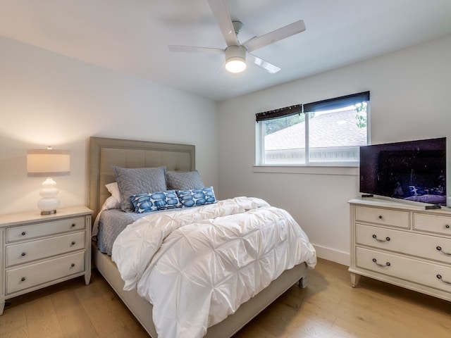 bedroom featuring ceiling fan and light wood-type flooring