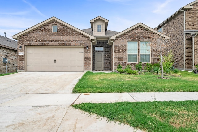 front facade with a garage and a front lawn