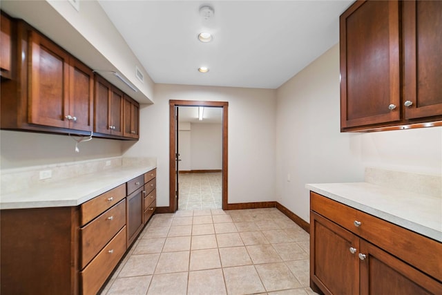 kitchen with light tile patterned floors