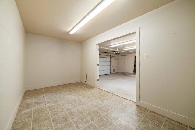 unfurnished room featuring light tile patterned floors