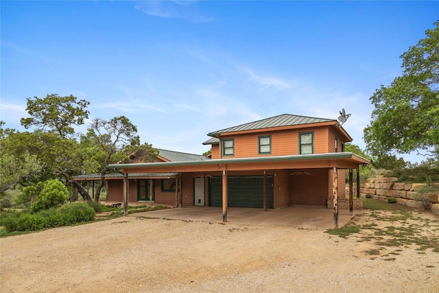 view of front of property with a garage