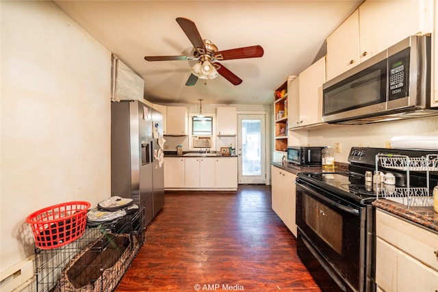 kitchen with ceiling fan, white cabinets, sink, black appliances, and dark hardwood / wood-style floors