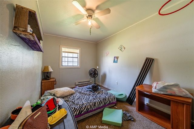 bedroom with ornamental molding, ceiling fan, carpet floors, and baseboard heating