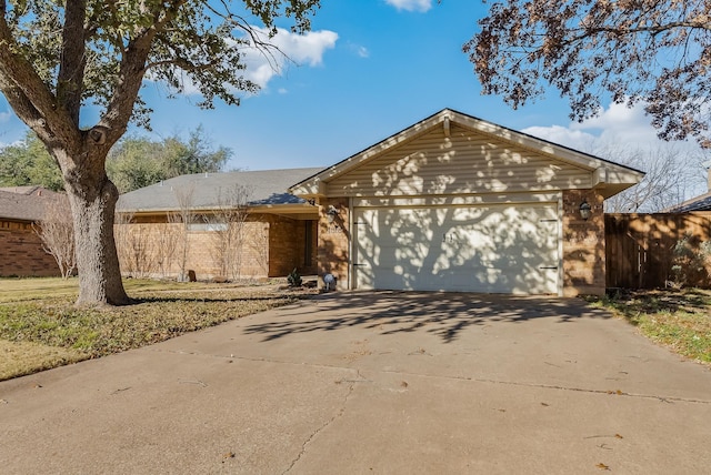 ranch-style home with a garage