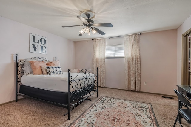 bedroom featuring carpet flooring and ceiling fan