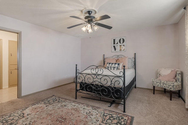 bedroom featuring ceiling fan and light colored carpet