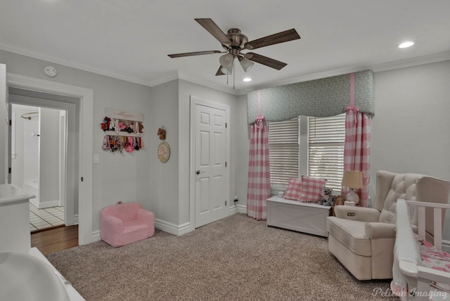 bedroom featuring ceiling fan, ornamental molding, and hardwood / wood-style flooring