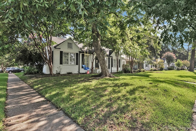 view of front of home with a front yard