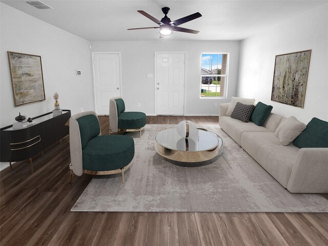 living room featuring ceiling fan and hardwood / wood-style floors