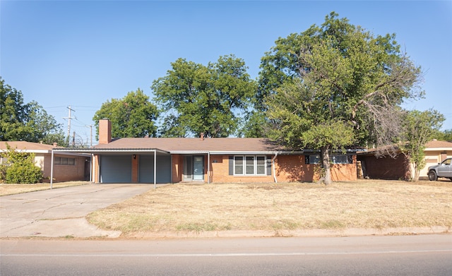 single story home featuring a garage