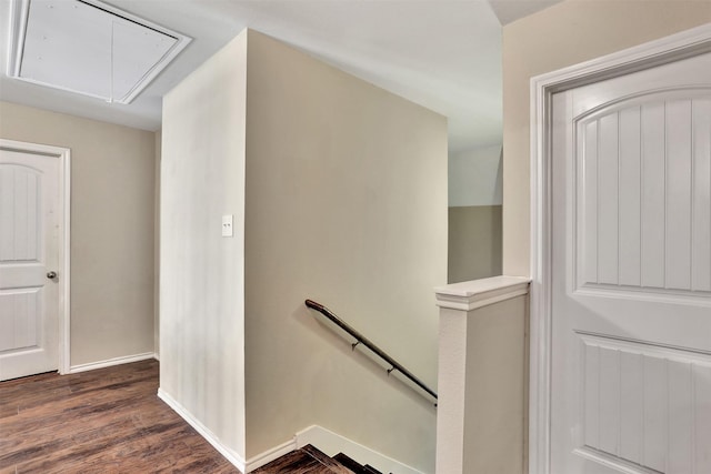 stairway featuring hardwood / wood-style flooring