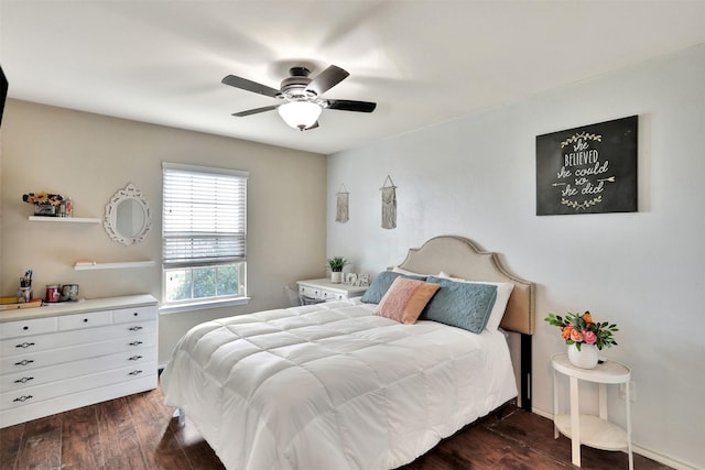 bedroom featuring ceiling fan and dark hardwood / wood-style floors