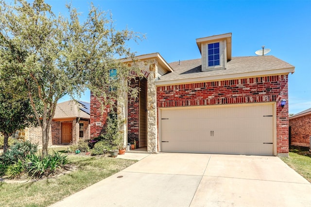 view of front of house with a garage