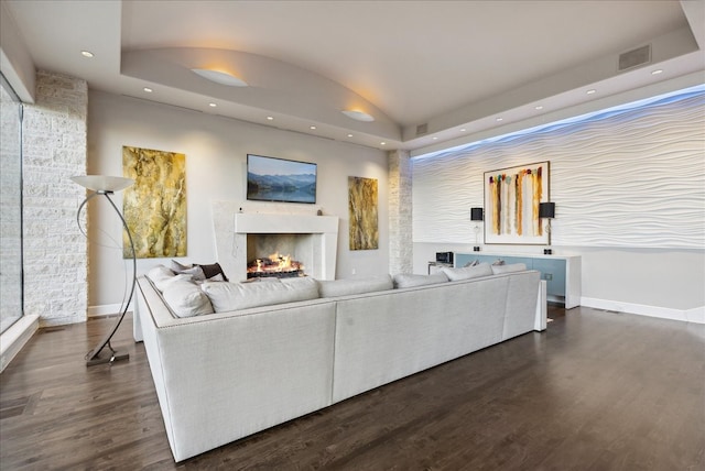 living room with dark hardwood / wood-style flooring