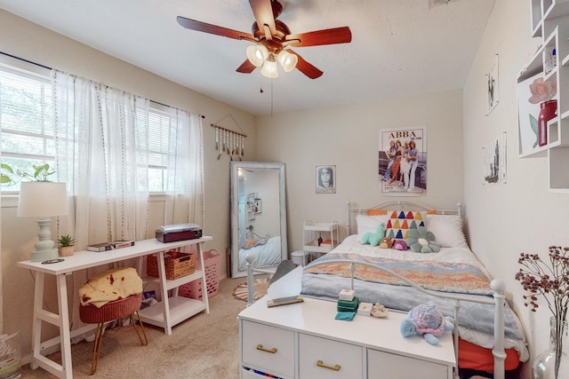 bedroom with light colored carpet