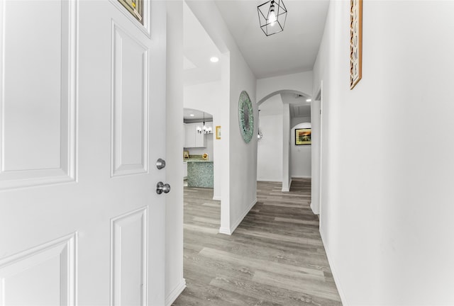 corridor featuring light hardwood / wood-style floors