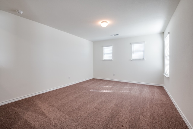 view of carpeted spare room