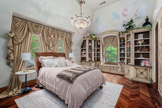 bedroom with multiple windows, parquet floors, and an inviting chandelier