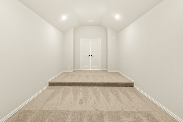 interior space featuring vaulted ceiling