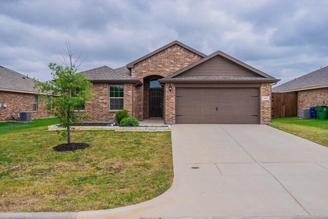 single story home featuring a front lawn, central AC unit, and a garage