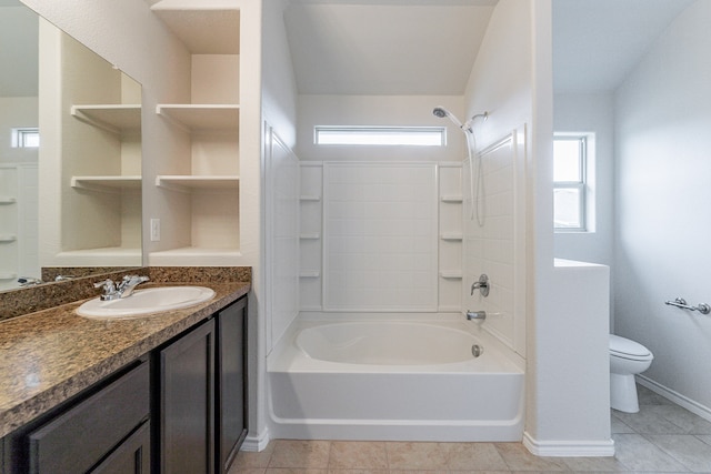 full bathroom with tile patterned floors, vanity, shower / bath combination, and toilet