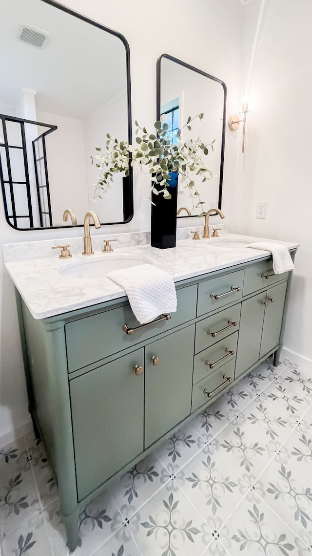 bathroom featuring tile patterned floors and double sink vanity