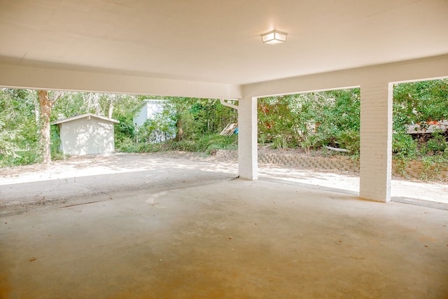 view of patio / terrace featuring an outbuilding