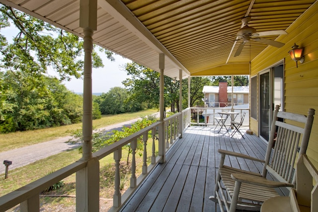 wooden deck with ceiling fan